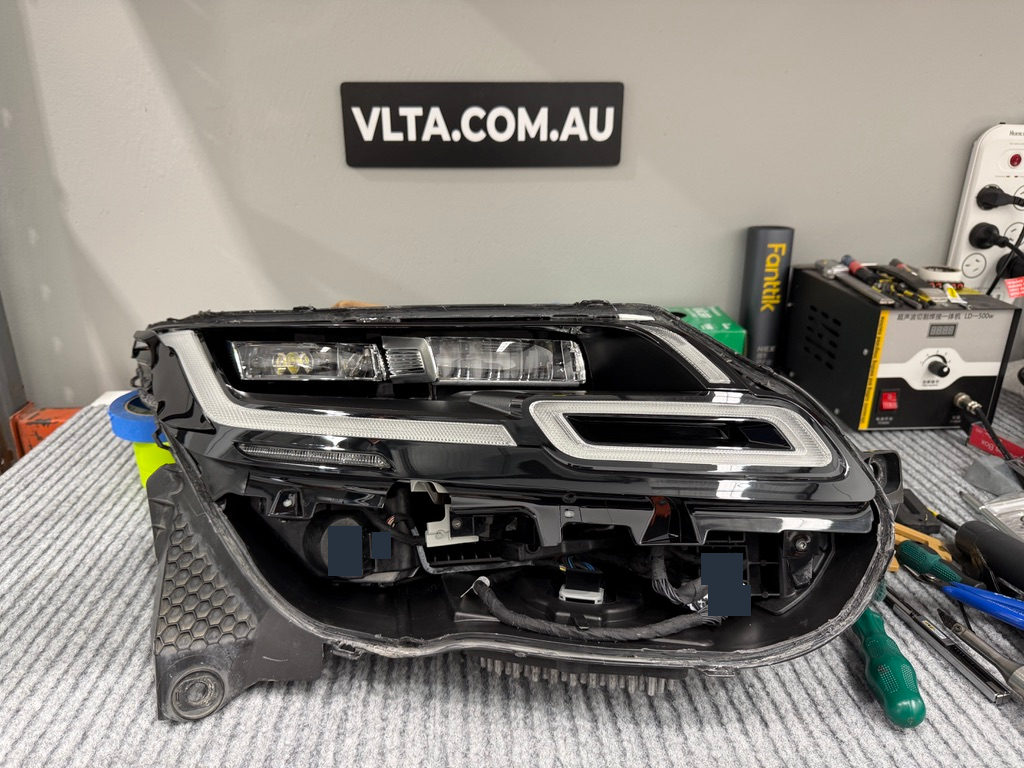 Removing the outer lens gave access to the DRL boards inside the headlight.